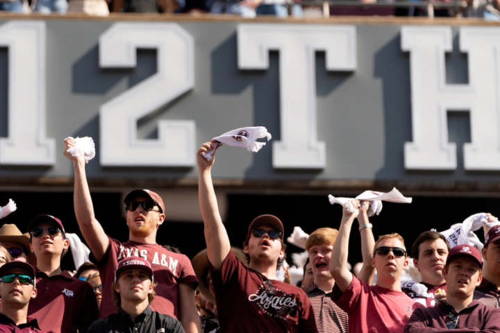 Students waving their 12th Man towels in the student section at Kyle Field