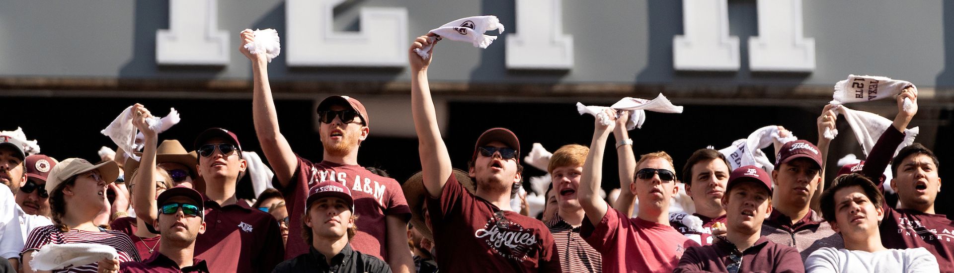 Students waving their 12th Man towels in the student section at Kyle Field